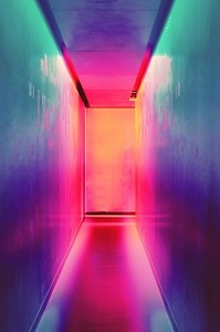 electric multicolour corridor leading to a door